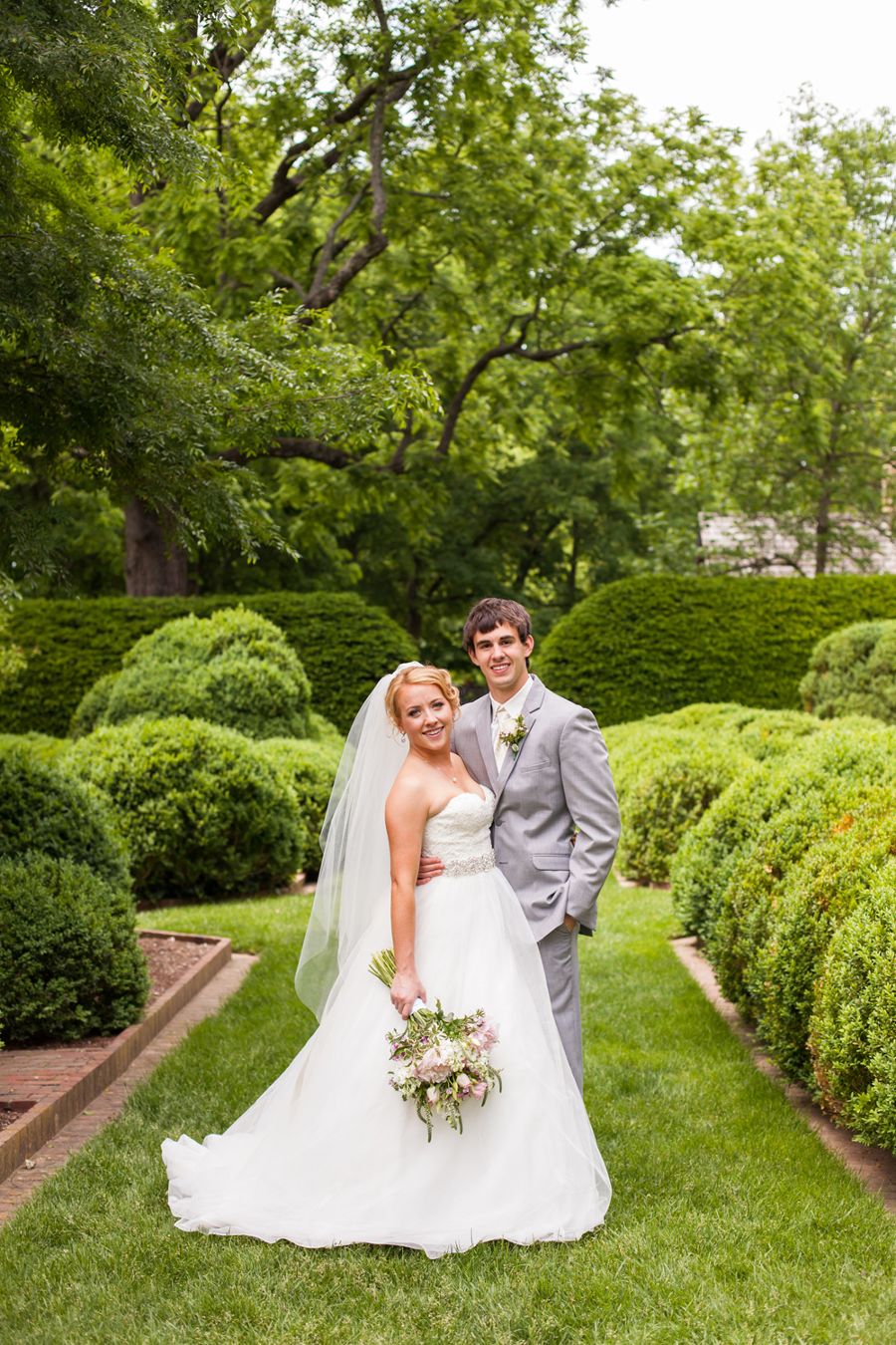 Bride and Groom in garden.